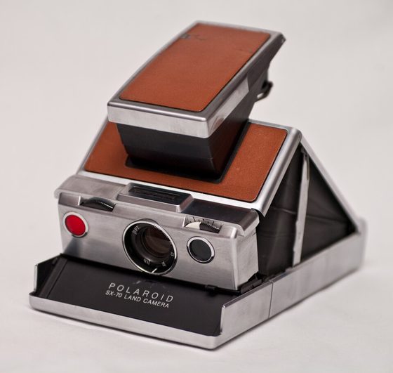 A Polaroid SX-70 instant camera.